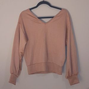 Long sleeved waist length top